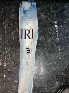 AMIRI Light Blue Skinny Jeans with Burgundy Embroidered Logo